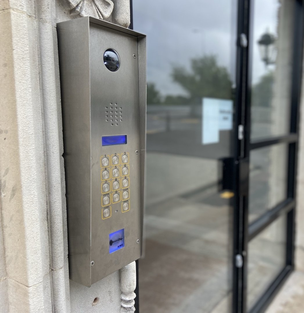 Door entry access control system installed at a commercial entrance