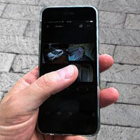 A smartphone with four cameras on the screen.